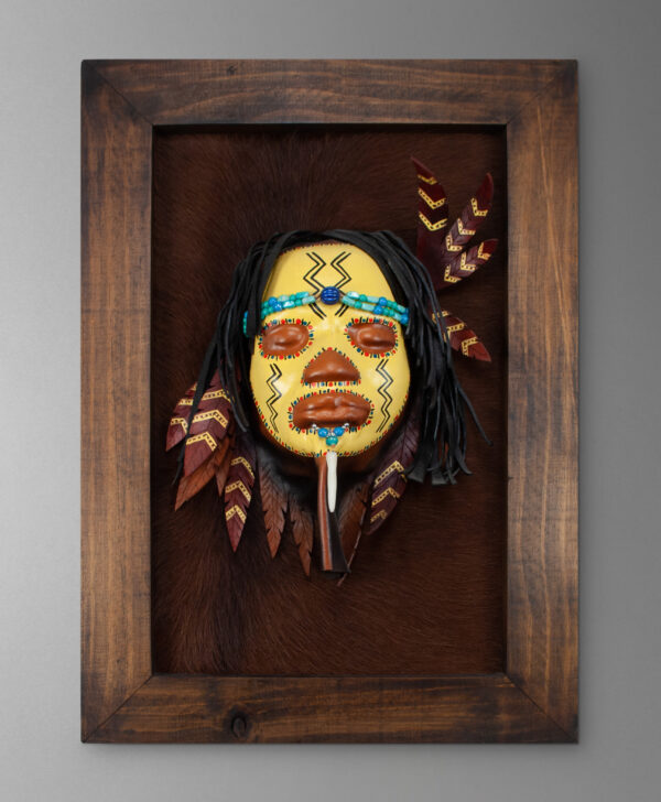 front view of american indian mask from colombia